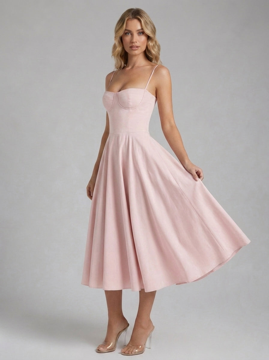 Beatrice Full Skirt Corset Midi Dress in Blush - front view with the skirt in movement
