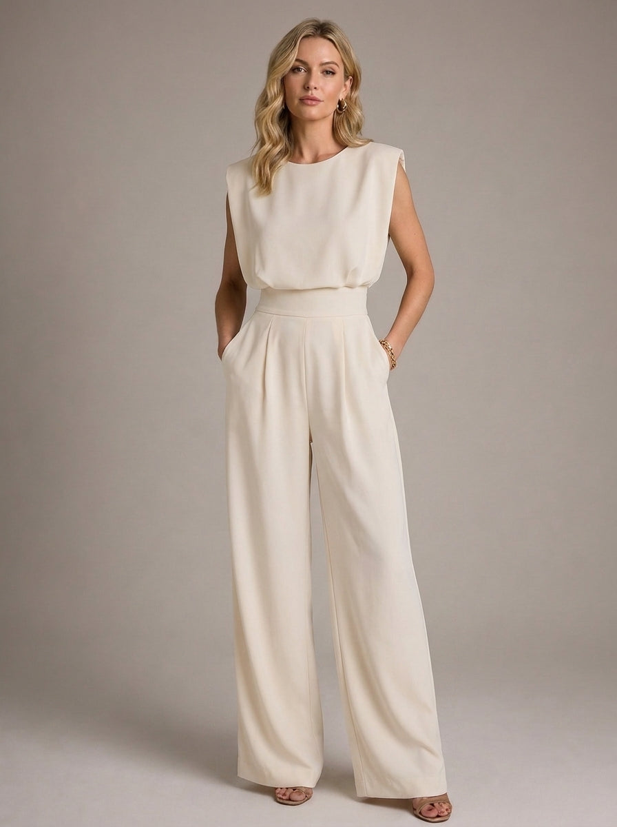 Charlotte Sleeveless Pleated Wide Leg Jumpsuit in Cream - full-length front view