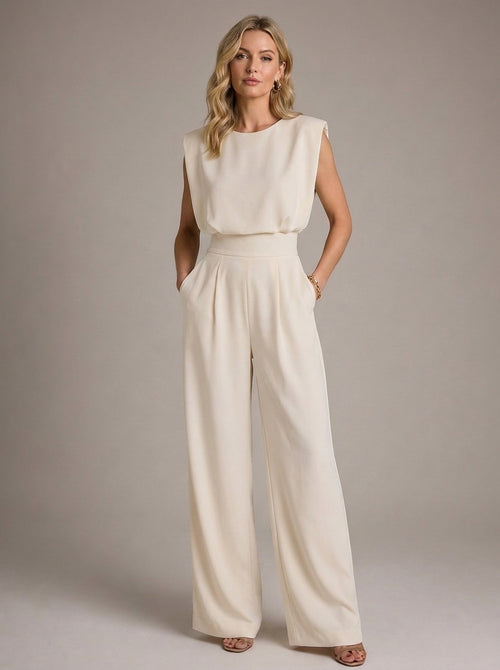 Charlotte Sleeveless Pleated Wide Leg Jumpsuit in Cream - full-length front view